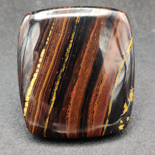 Fire Red Iron Tiger Eye Cabochon 110.35 carats (22.07g)